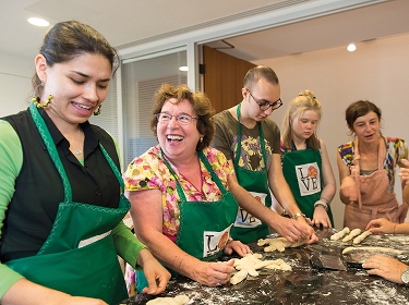 'Challah for Hunger', social action workshop in the JW3 demonstration kitchen. Photo: Hugo Gledinning.